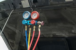 Performance and climate impact assessment of R152a and R1234yf as drop-in replacements for R134a in automotive AC systems