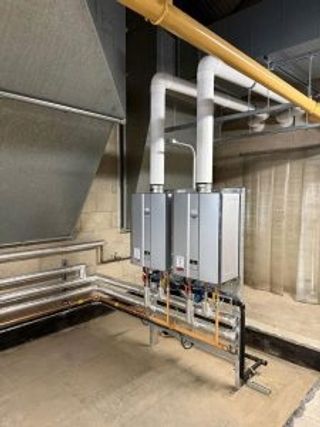 Arcus Installs Rinnai High Efficiency Water Heaters to Replace Storage and Lower Onsite Carbon at Major Superstore